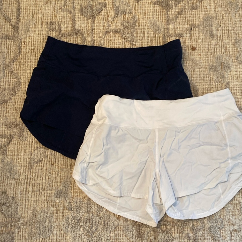 Lululemon running shorts bundle. Navy and white